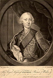 Half-length monochrome portrait of a young clean-shaven man wearing a sash, a finely-embroidered jacket, the star of the Order of the Garter, and a powdered wig.