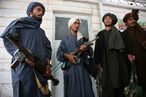 File:Insurgents Lay Down Weapons.jpg