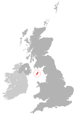 Location of Isle of Man (red)in the Irish Sea (Manx Sea) between England · Scotland · Wales and Northern Ireland (dark grey)