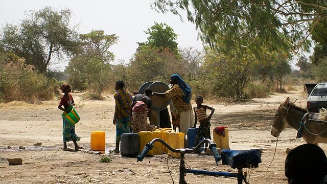 File:Balga, February 2010, Women around the water pump.jpg