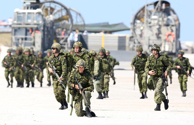 File:US Navy 090425-M-9917S-314 Canadian Army soldiers assigned to Alpha Company, 3d Battalion, 22d Regiment of Special Purpose Marine Air Ground Task Force-24 depart a U.S. Navy landing craft air cushion (LCAC) and deploy onto Mayp.jpg
